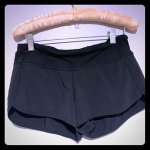 black shirt athletic shorts